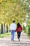 couple-walking-happy-autumn-park-35295520