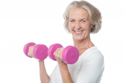 Lifting light weights helps strengthen your muscles. Photo: Free Digital Photos